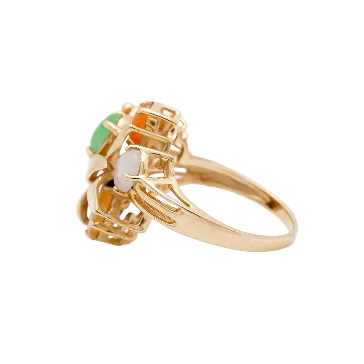 Side view of a vintage 14k yellow gold multi-color jade cluster ring showing the openwork leaf motif setting and polished band. Size 5.5, weighs 3.86 grams.