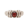 Front view of a vintage 925 sterling silver ring featuring a classic twisted rope design and a centered round red garnet cabochon. Size 6.5, weighs 4.97 grams. Stamped 925. Very good vintage condition.