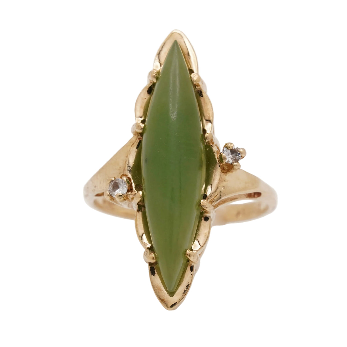 Vintage 10K gold ring with a marquise natural nephrite jade cabochon and two small colorless side stones, face-up.
