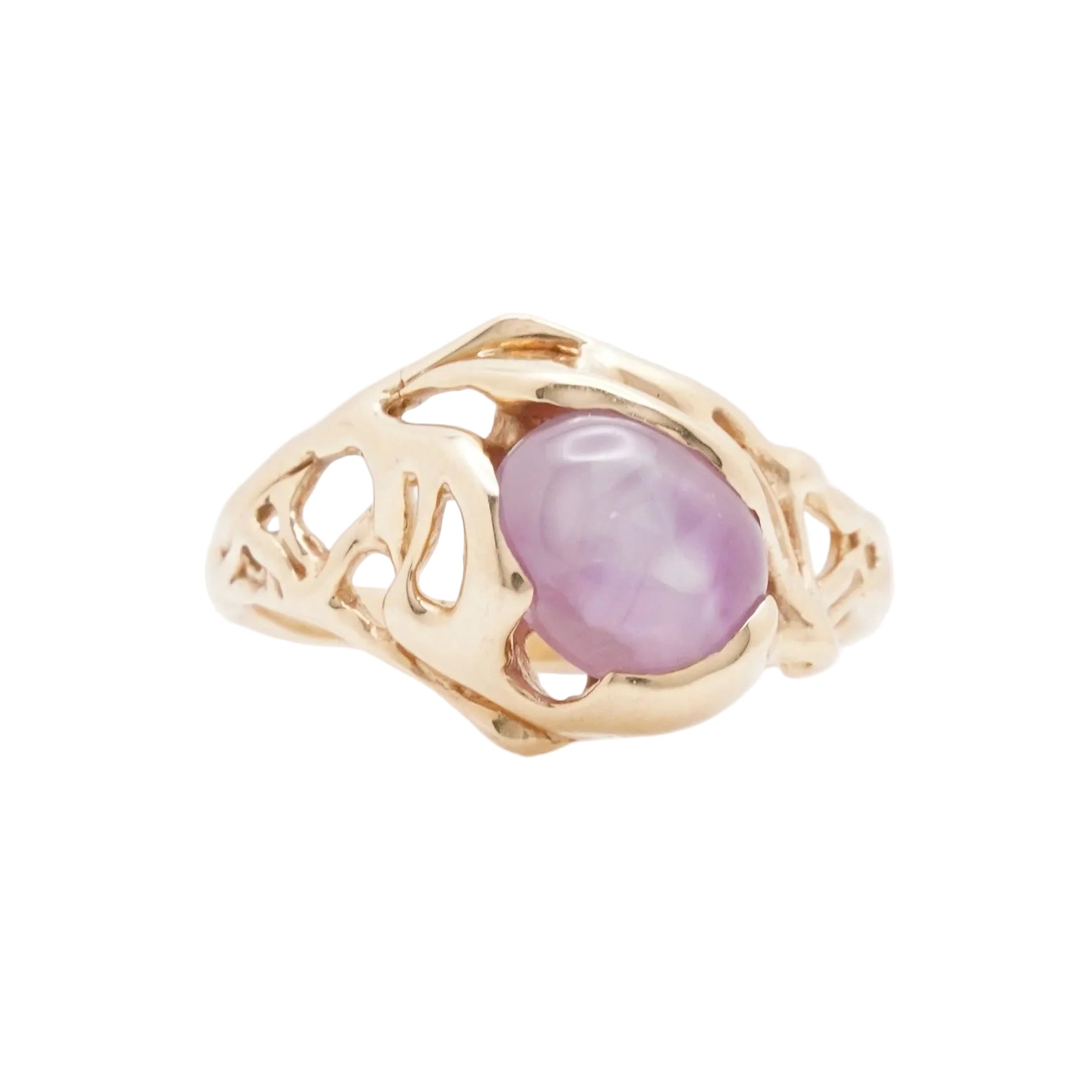 pink star sapphire in 14k yellow gold on white background