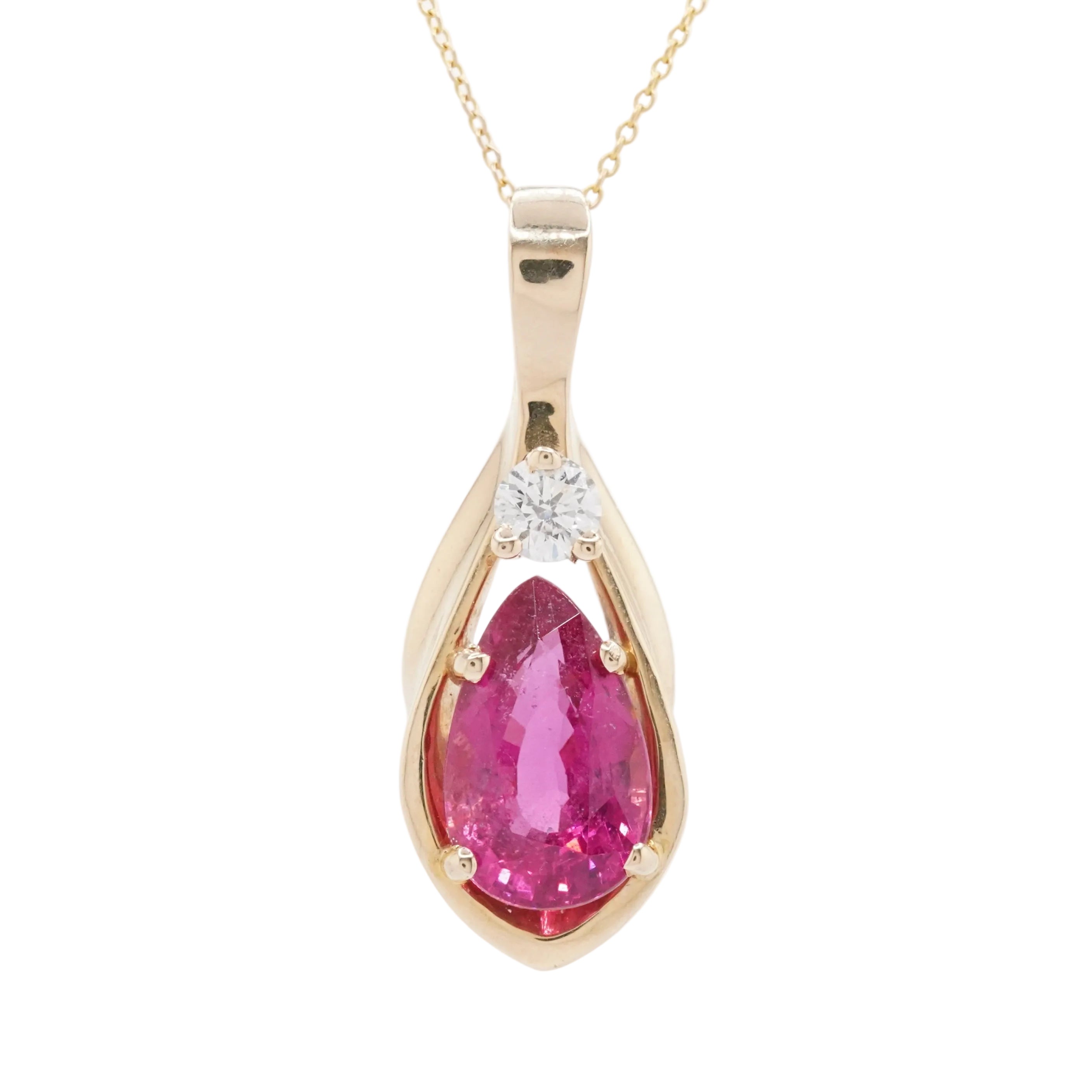 Gold pendant with a pink rubellite gemstone and diamond on a white background