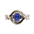 Vintage sterling silver ring with an oval synthetic sapphire and two natural diamond side stones, stamped 925